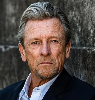 A portrait of Tony Bonner AM.